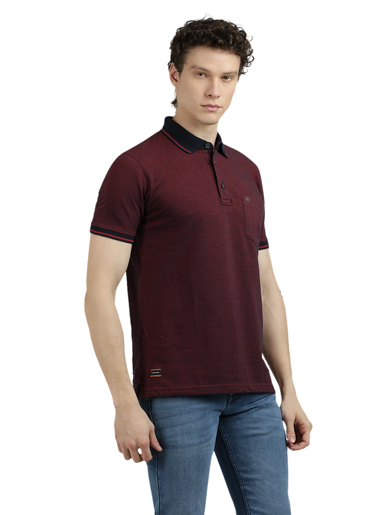 Model wearing Clarke Gable's Dark Maroon Solid Polo Collar T-Shirt in a casual setting