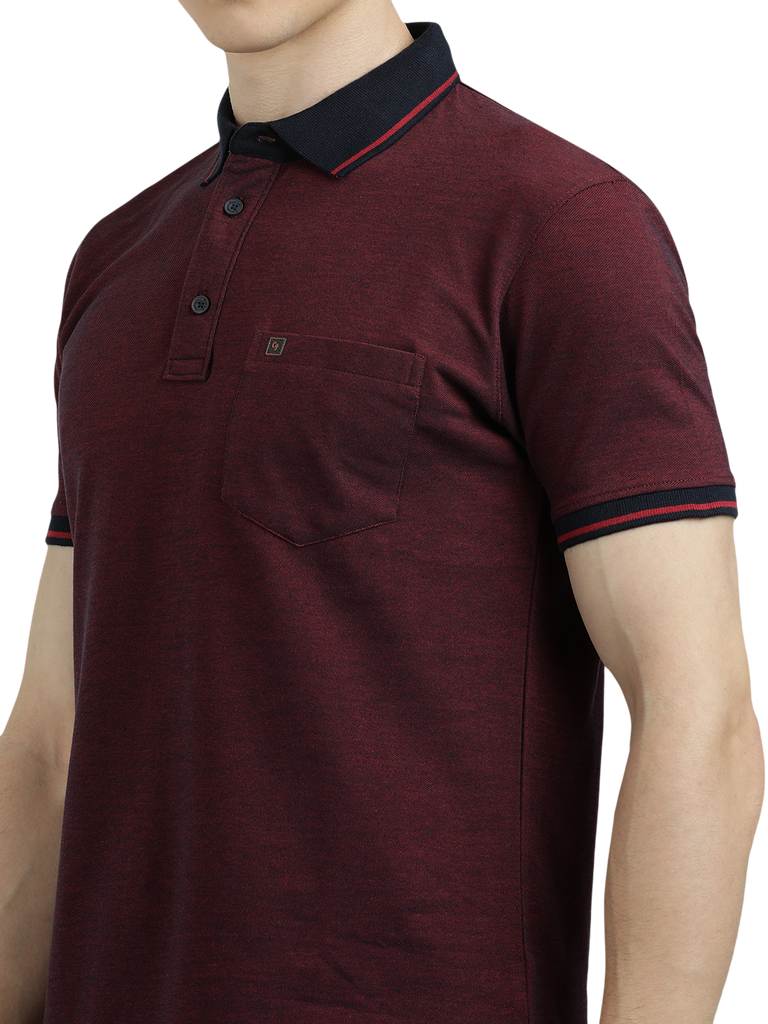 Model wearing Clarke Gable's Dark Maroon Solid Polo Collar T-Shirt in a casual setting