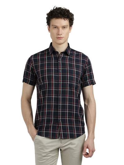 Model wearing Clarke Gable's Dark Navy Checked Semi Casual Shirt in a casual setting