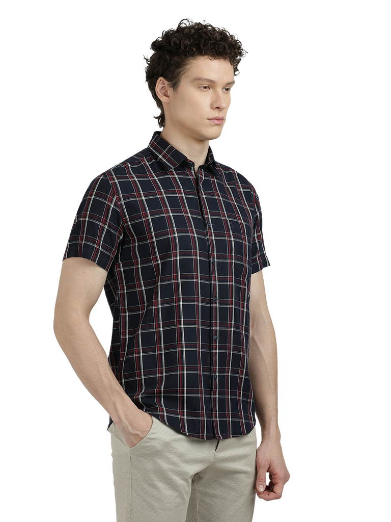 Model wearing Clarke Gable's Dark Navy Checked Semi Casual Shirt in a casual setting