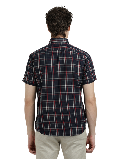 Model wearing Clarke Gable's Dark Navy Checked Semi Casual Shirt in a casual setting