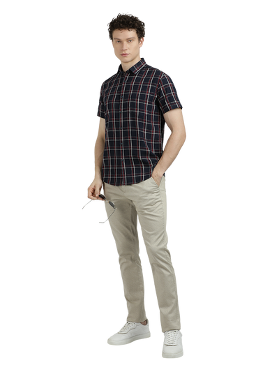 Model wearing Clarke Gable's Dark Navy Checked Semi Casual Shirt in a casual setting