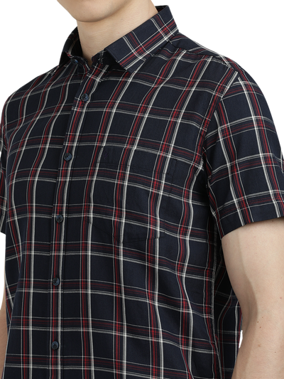 Model wearing Clarke Gable's Dark Navy Checked Semi Casual Shirt in a casual setting