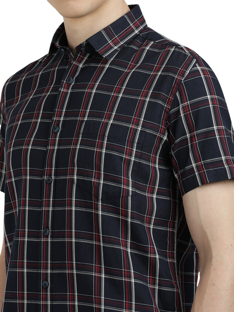 Model wearing Clarke Gable's Dark Navy Checked Semi Casual Shirt in a casual setting