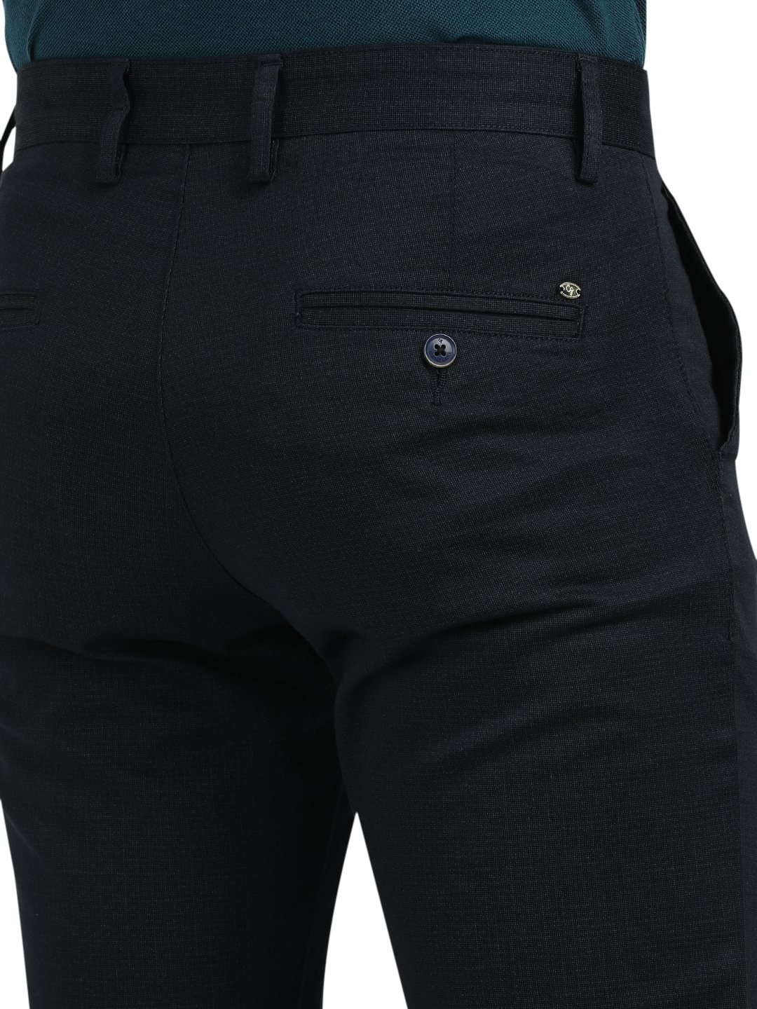 Model wearing Clarke Gable's Dark Navy Custom Fit Trousers in a casual setting