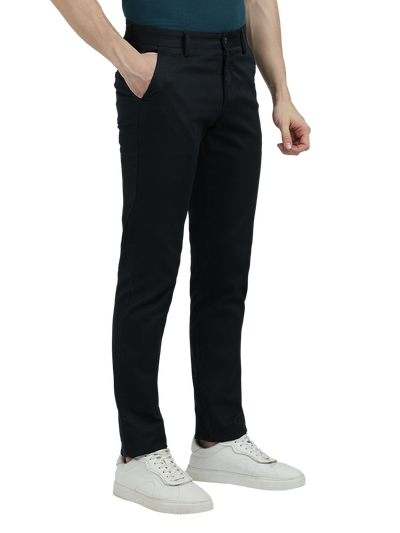 Model wearing Clarke Gable's Dark Navy Custom Fit Trousers in a casual setting