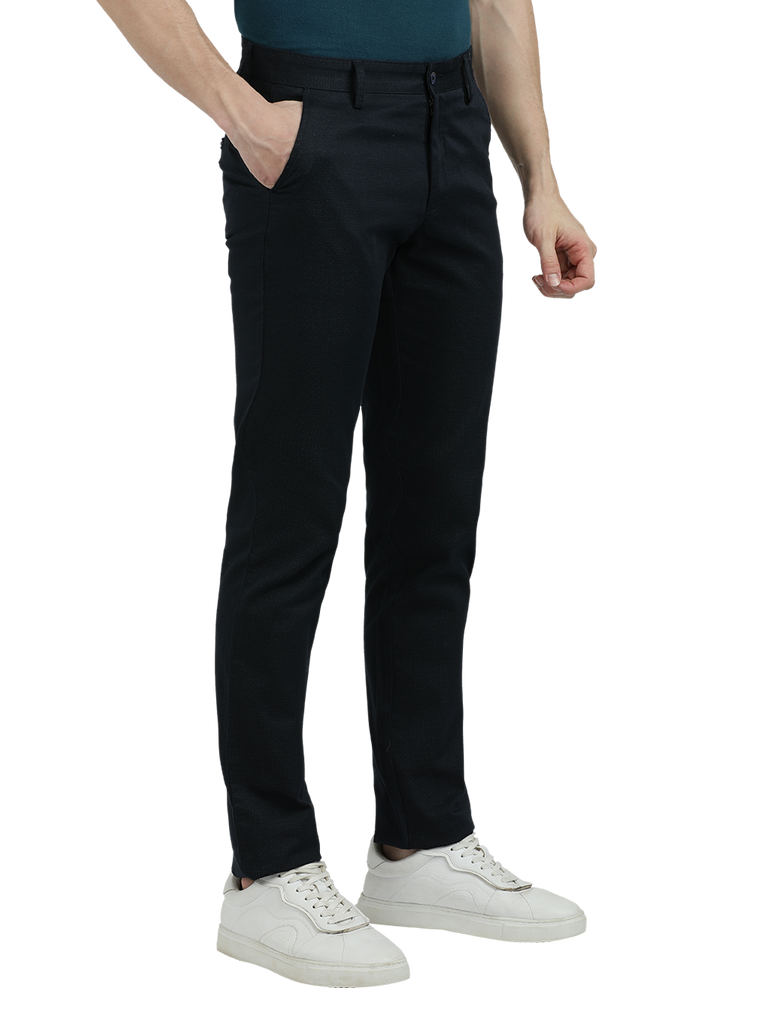 Model wearing Clarke Gable's Dark Navy Custom Fit Trousers in a casual setting