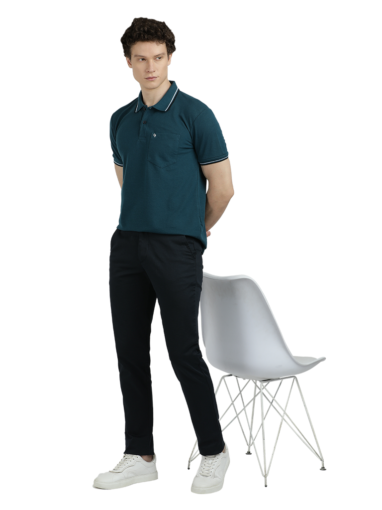 Model wearing Clarke Gable's Dark Navy Custom Fit Trousers in a casual setting