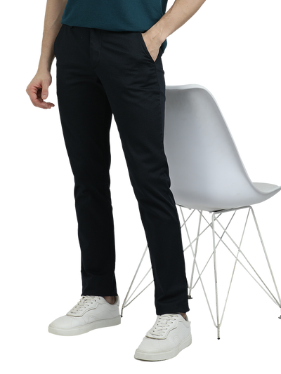 Model wearing Clarke Gable's Dark Navy Custom Fit Trousers in a casual setting