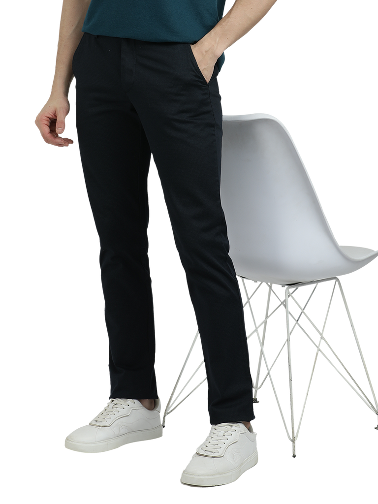 Model wearing Clarke Gable's Dark Navy Custom Fit Trousers in a casual setting