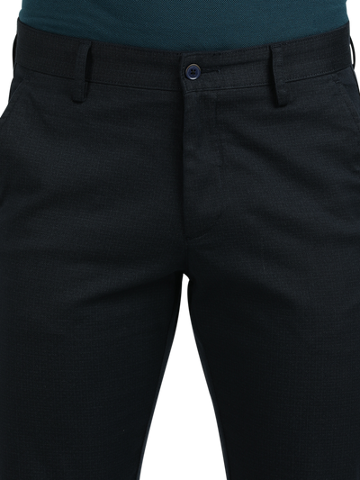 Model wearing Clarke Gable's Dark Navy Custom Fit Trousers in a casual setting