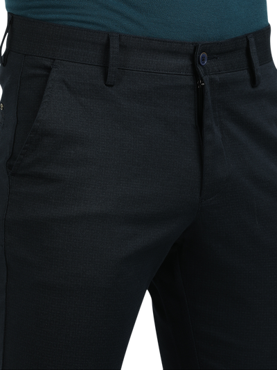 Model wearing Clarke Gable's Dark Navy Custom Fit Trousers in a casual setting