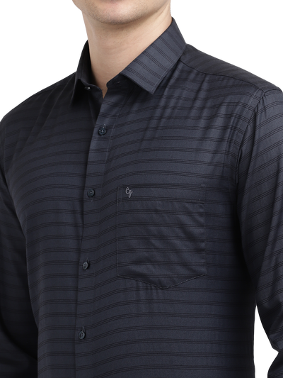 Model wearing Clarke Gable's Dark Navy Striped Formal Shirt in a casual setting