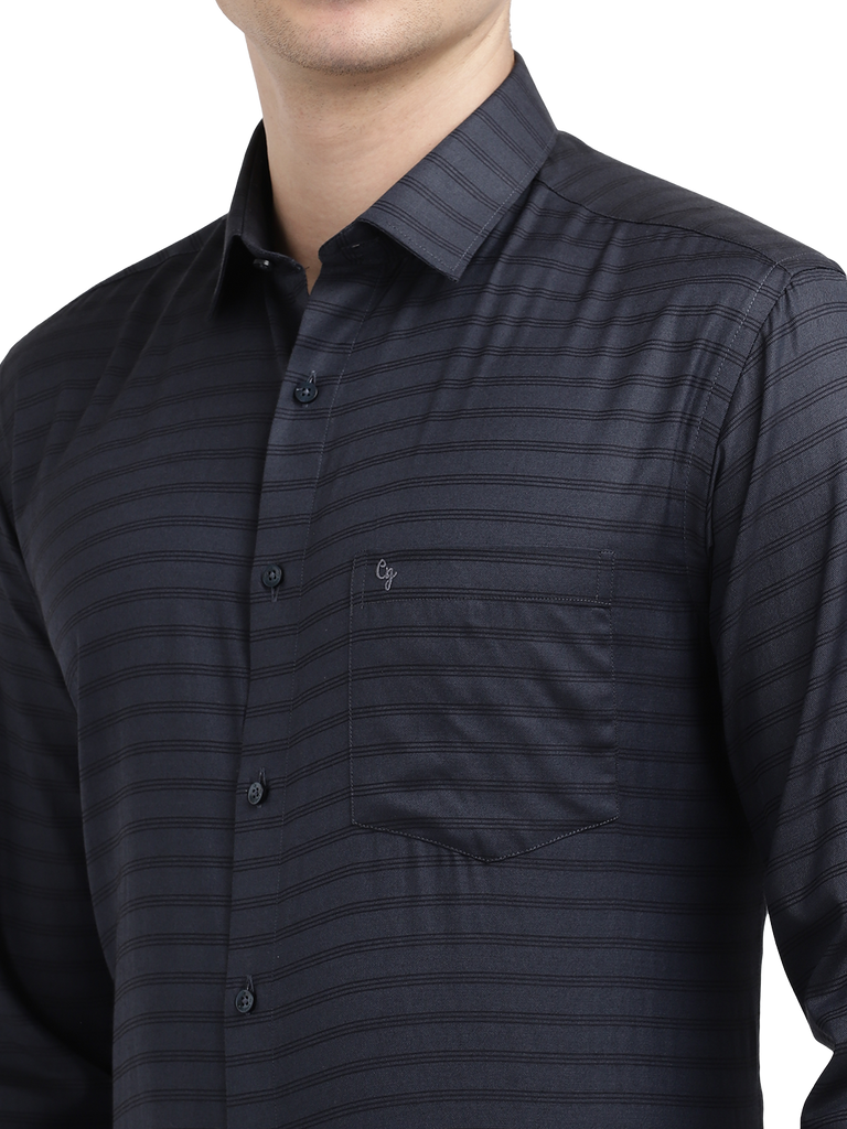 Model wearing Clarke Gable's Dark Navy Striped Formal Shirt in a casual setting