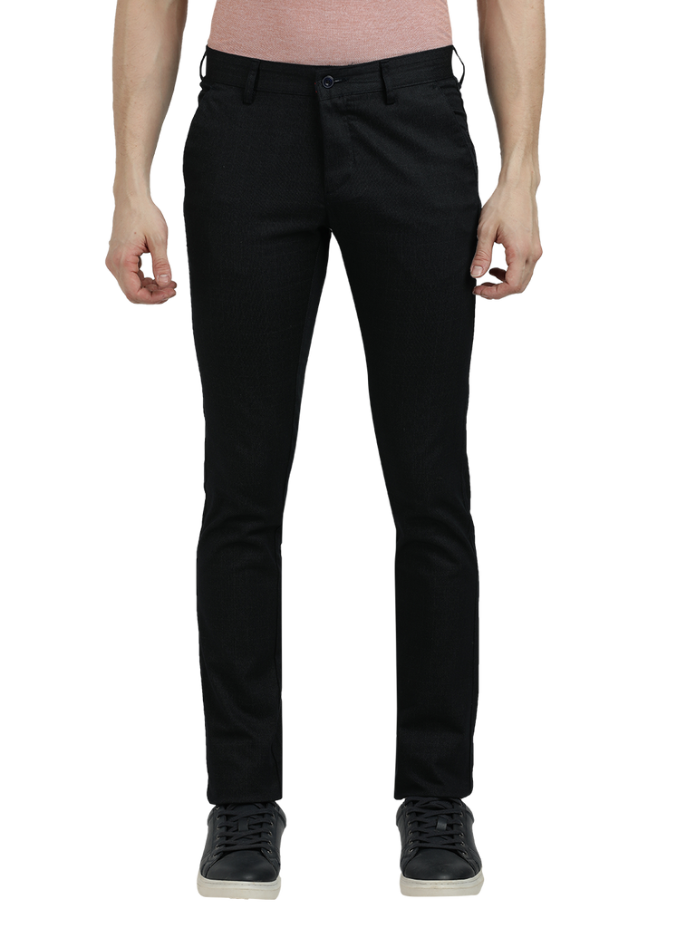 Model wearing Clarke Gable's Dark Navy Trim Fit Trousers in a casual setting