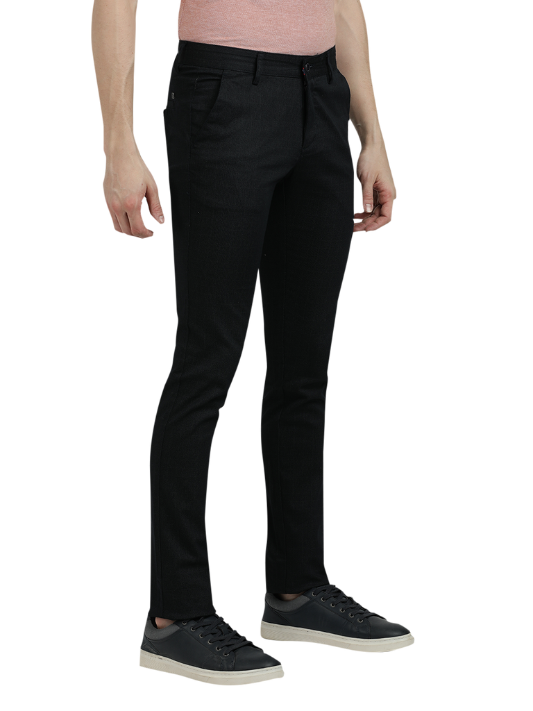 Model wearing Clarke Gable's Dark Navy Trim Fit Trousers in a casual setting