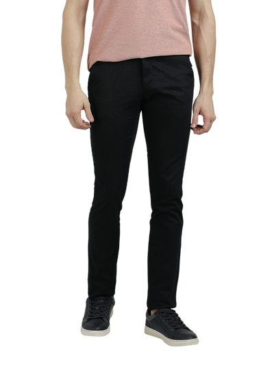 Model wearing Clarke Gable's Dark Navy Trim Fit Trousers in a casual setting