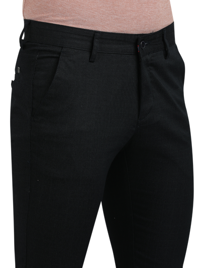 Model wearing Clarke Gable's Dark Navy Trim Fit Trousers in a casual setting