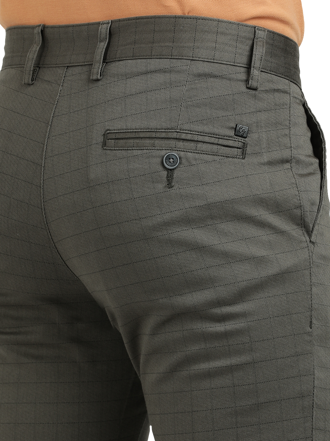 Model wearing Clarke Gable's Dark Olive Custom Fit Trousers in a casual setting