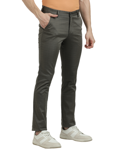 Model wearing Clarke Gable's Dark Olive Custom Fit Trousers in a casual setting