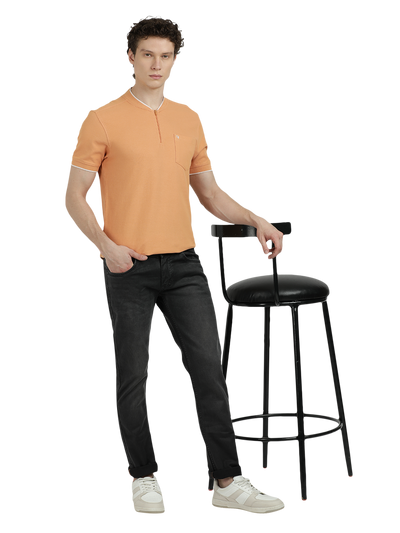 Model wearing Clarke Gable's Dark Olive Tinted Skinny Fit Jeans in a casual setting