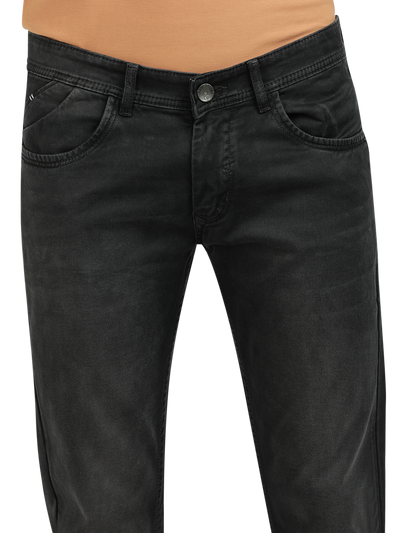 Model wearing Clarke Gable's Dark Olive Tinted Skinny Fit Jeans in a casual setting