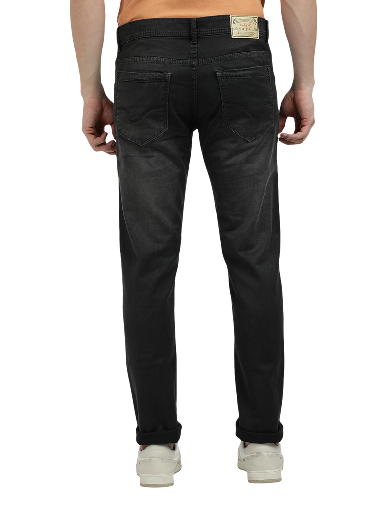 Model wearing Clarke Gable's Dark Olive Tinted Skinny Fit Jeans in a casual setting