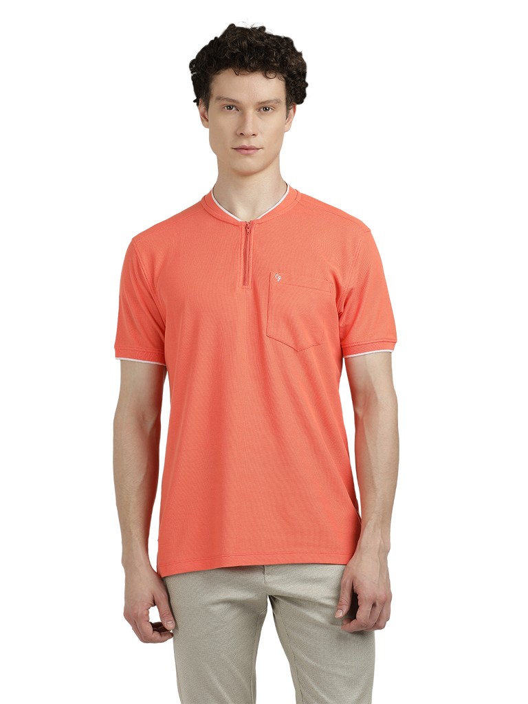 Model wearing Clarke Gable's Dark Orange Solid Henley Neck T-Shirt in a casual setting