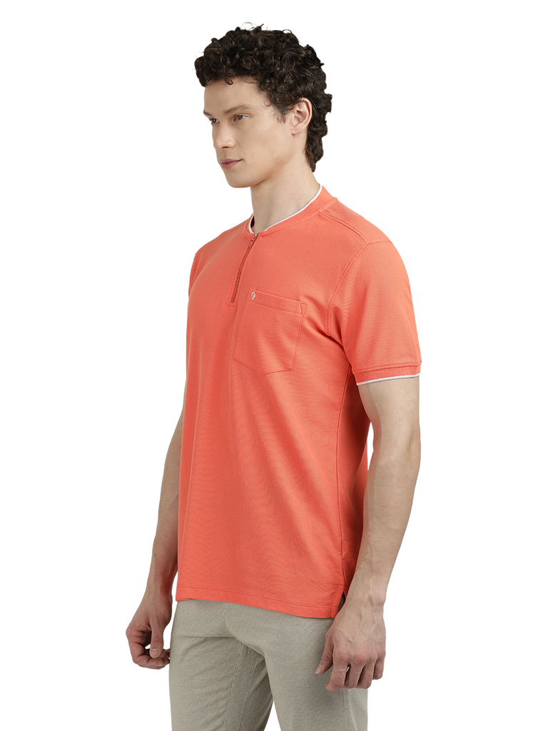 Model wearing Clarke Gable's Dark Orange Solid Henley Neck T-Shirt in a casual setting