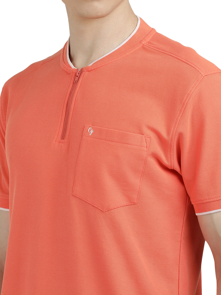 Model wearing Clarke Gable's Dark Orange Solid Henley Neck T-Shirt in a casual setting