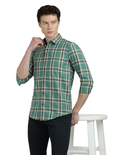 Model wearing Clarke Gable's Green Checked Semi Casual Shirt in a casual setting