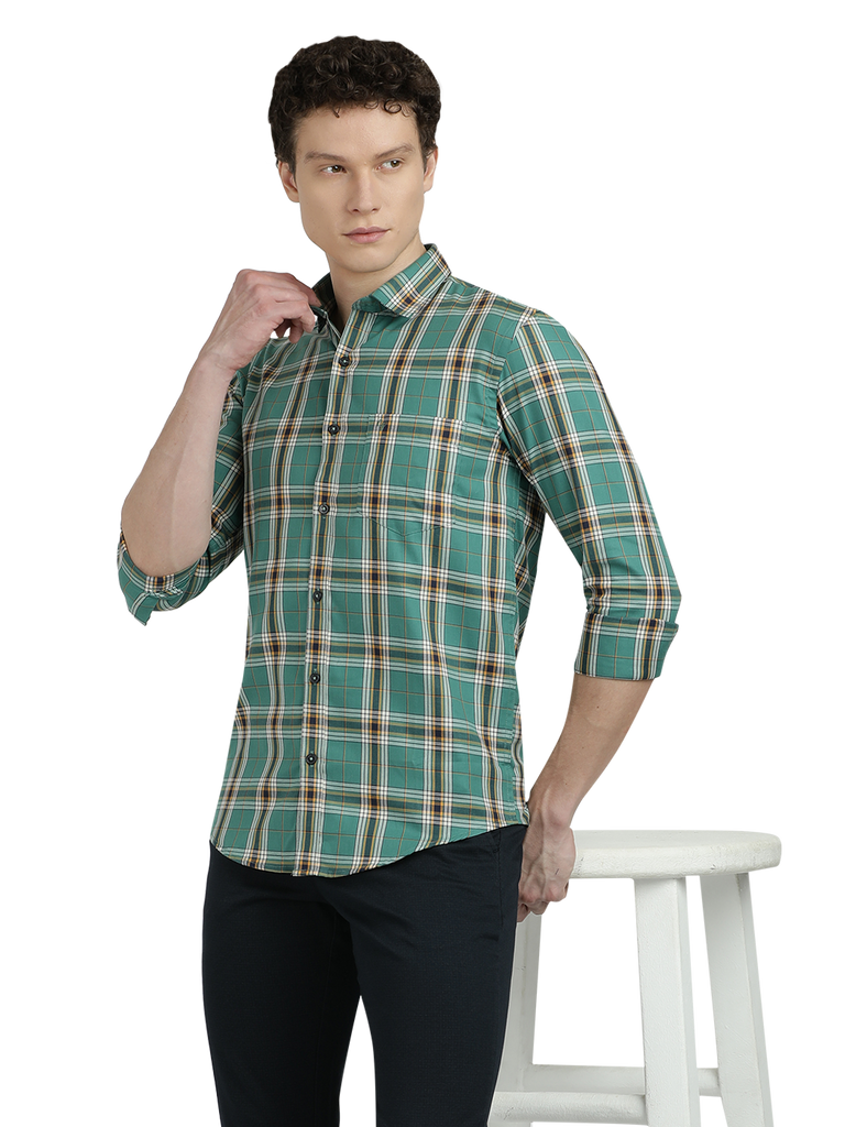 Model wearing Clarke Gable's Green Checked Semi Casual Shirt in a casual setting