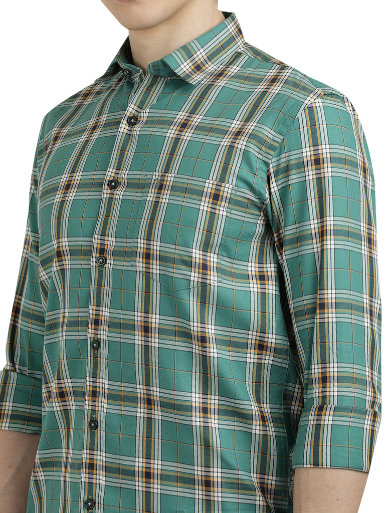 Model wearing Clarke Gable's Green Checked Semi Casual Shirt in a casual setting