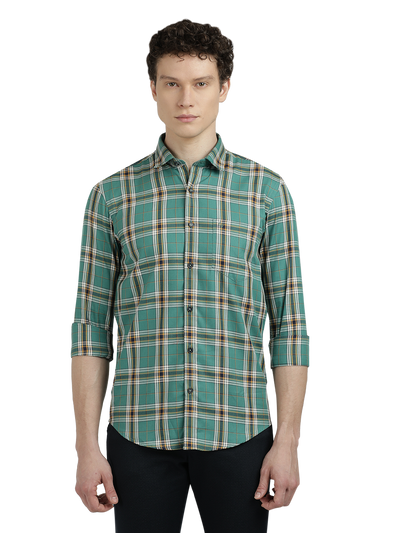 Model wearing Clarke Gable's Green Checked Semi Casual Shirt in a casual setting