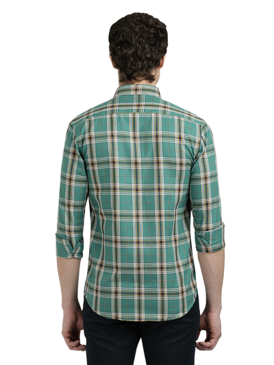 Model wearing Clarke Gable's Green Checked Semi Casual Shirt in a casual setting