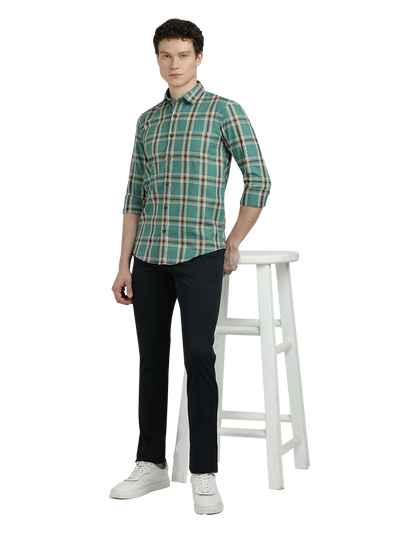 Model wearing Clarke Gable's Green Checked Semi Casual Shirt in a casual setting