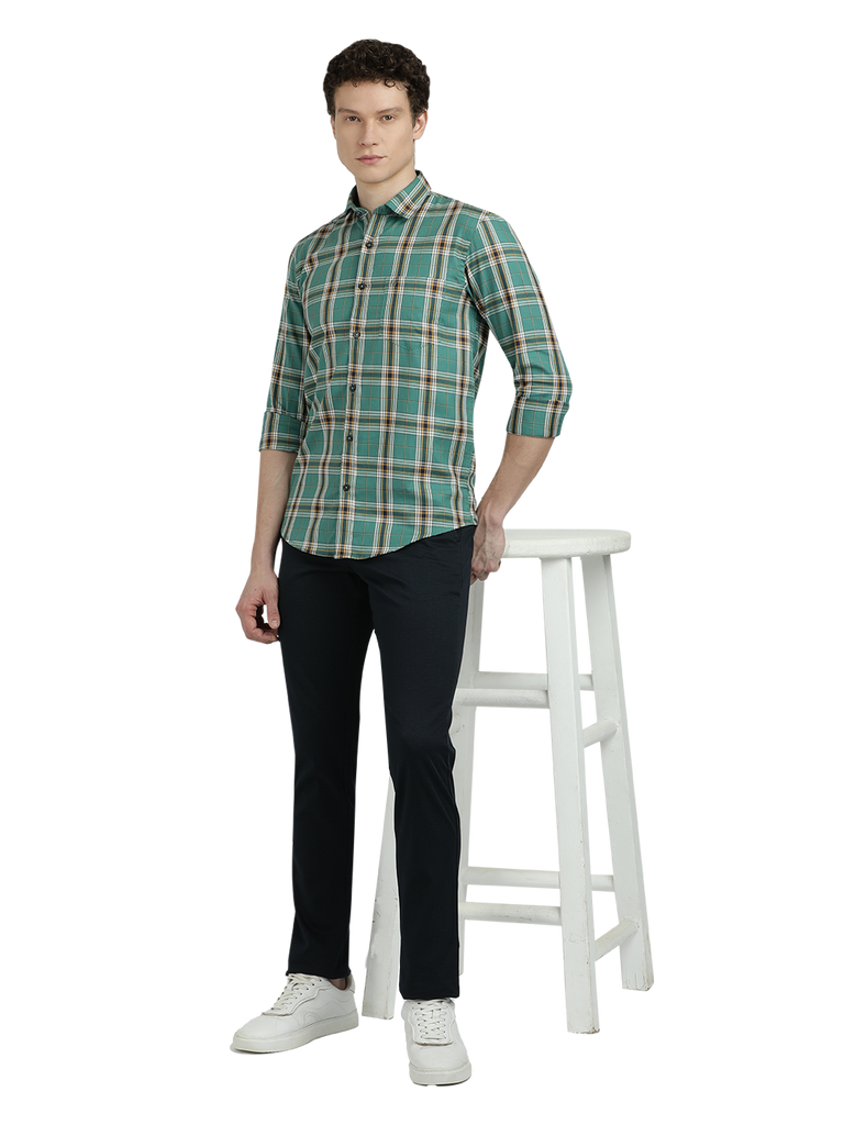 Model wearing Clarke Gable's Green Checked Semi Casual Shirt in a casual setting