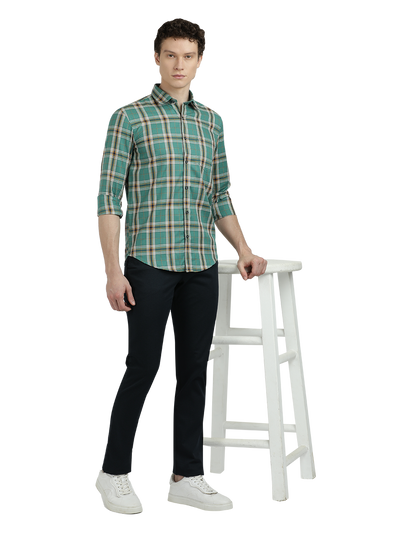 Model wearing Clarke Gable's Green Checked Semi Casual Shirt in a casual setting