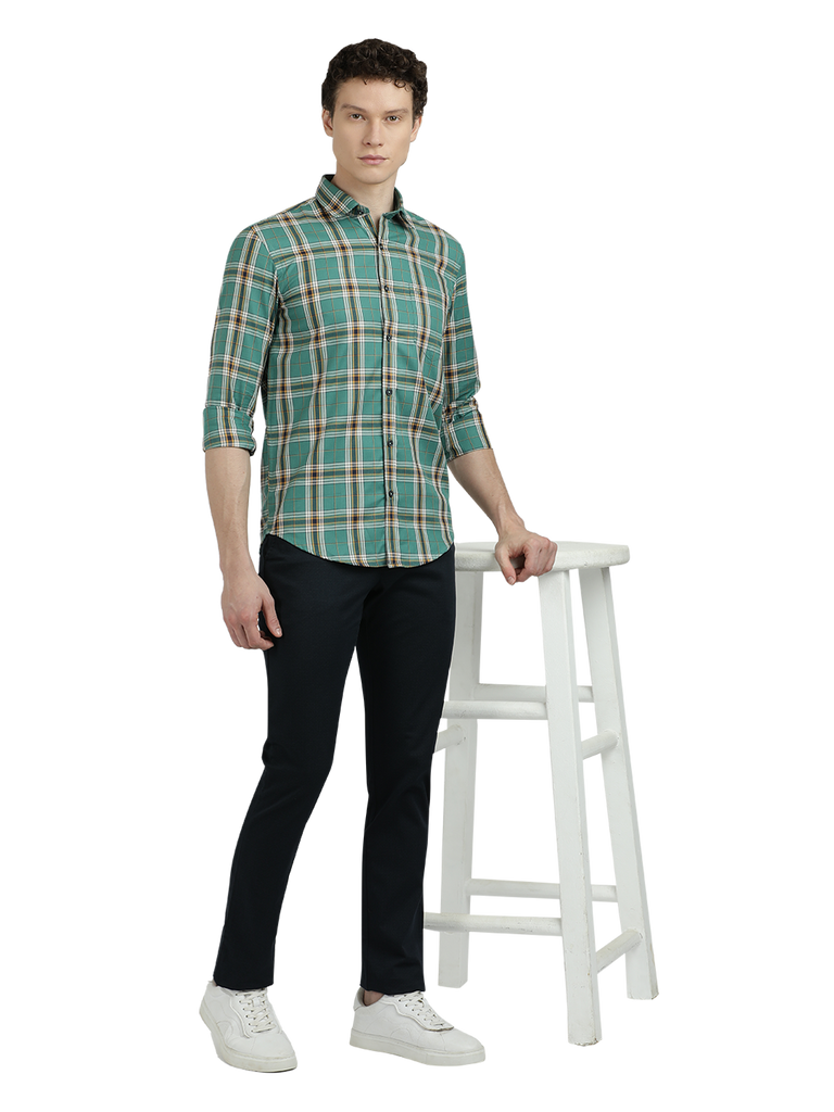 Model wearing Clarke Gable's Green Checked Semi Casual Shirt in a casual setting