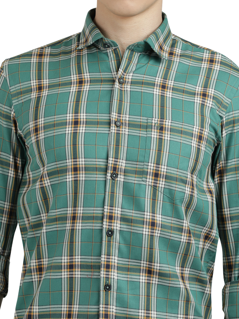 Model wearing Clarke Gable's Green Checked Semi Casual Shirt in a casual setting