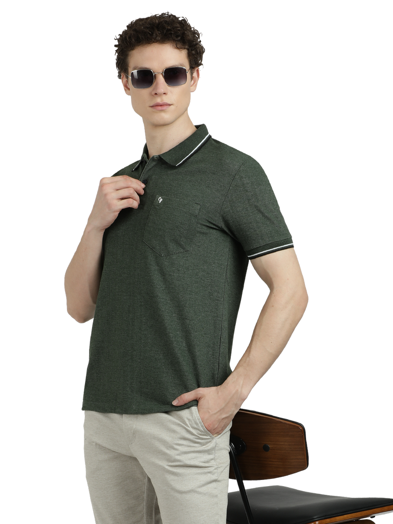 Model wearing Clarke Gable's Green Solid Polo Collar T-Shirt in a casual setting