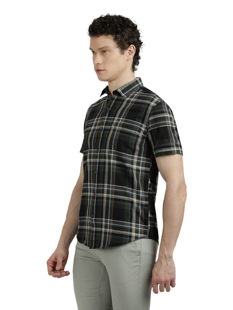 Model wearing Clarke Gable's Green With Black Checked Semi Casual Shirt in a casual setting