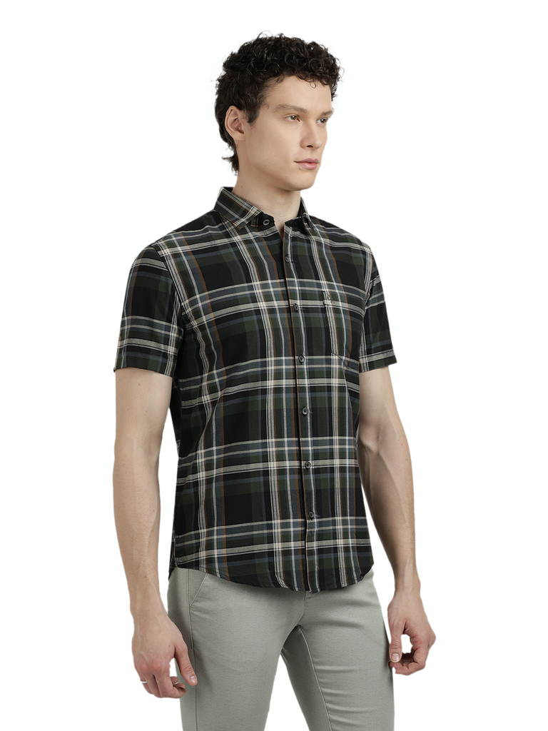 Model wearing Clarke Gable's Green With Black Checked Semi Casual Shirt in a casual setting