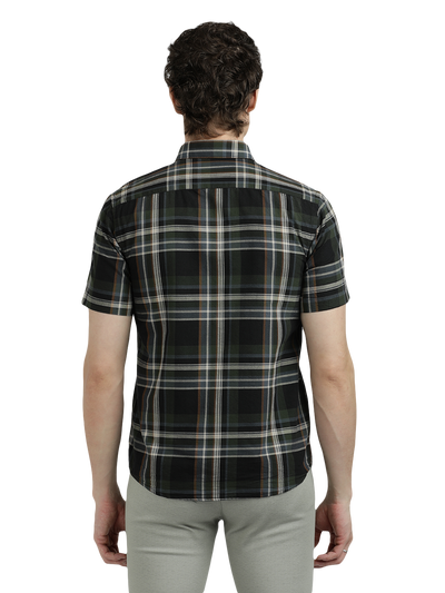 Model wearing Clarke Gable's Green With Black Checked Semi Casual Shirt in a casual setting
