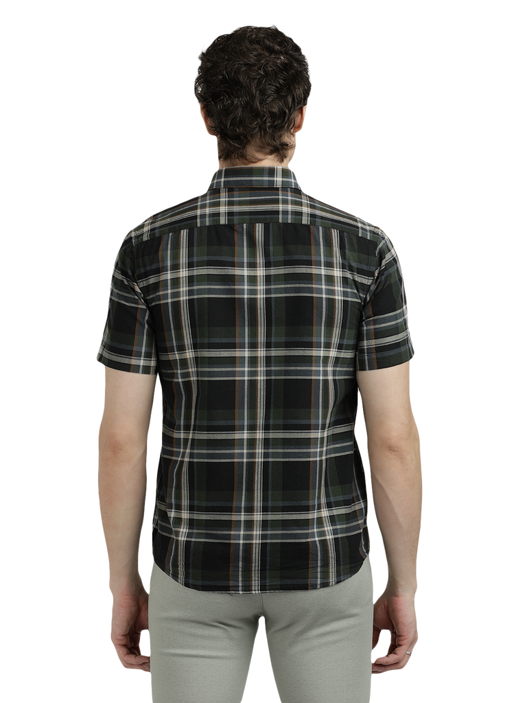 Model wearing Clarke Gable's Green With Black Checked Semi Casual Shirt in a casual setting