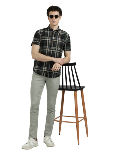 Model wearing Clarke Gable's Green With Black Checked Semi Casual Shirt in a casual setting