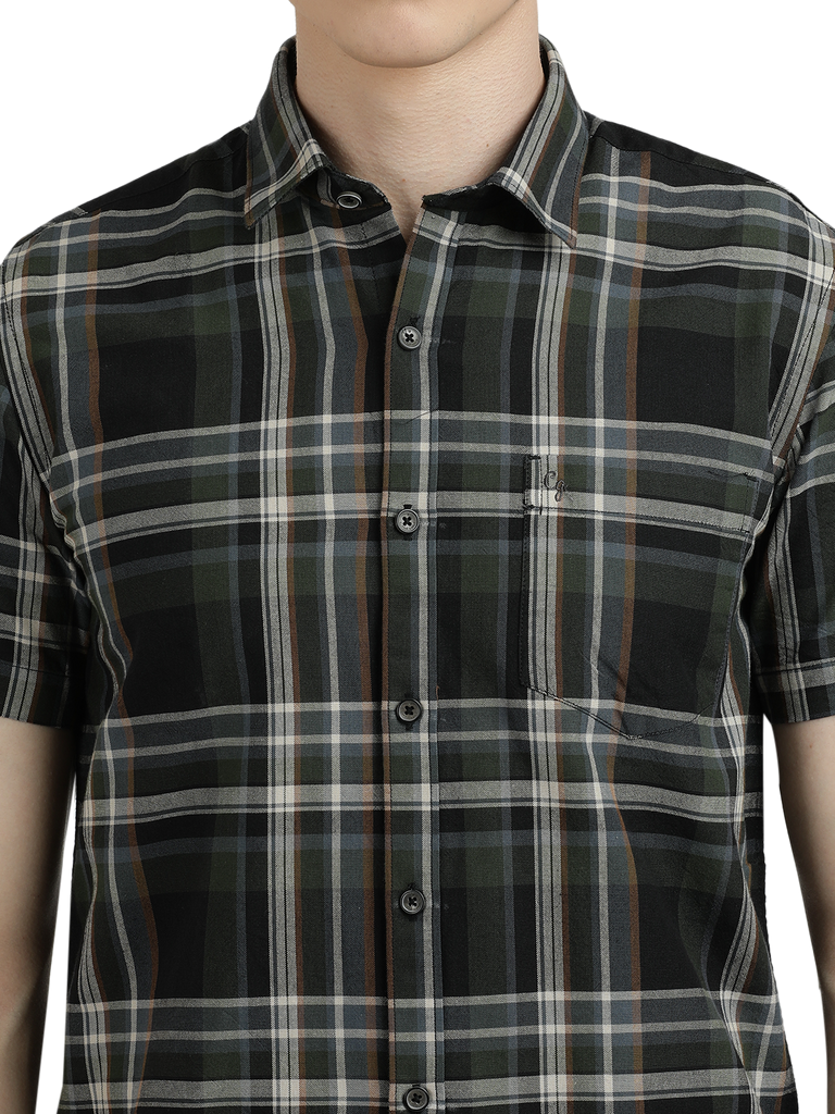 Model wearing Clarke Gable's Green With Black Checked Semi Casual Shirt in a casual setting