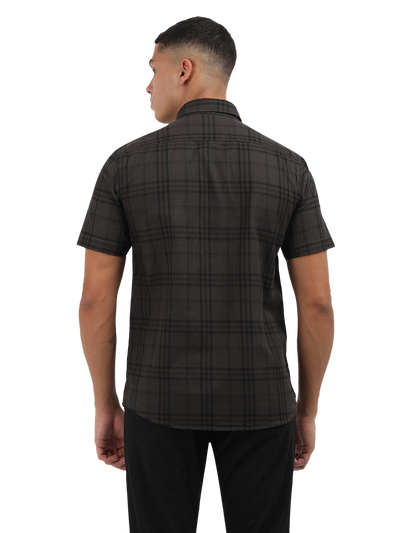 Model wearing Clarke Gable's Grey Checked Semi Casual Shirt in a casual setting