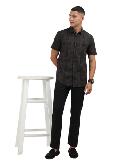 Model wearing Clarke Gable's Grey Checked Semi Casual Shirt in a casual setting