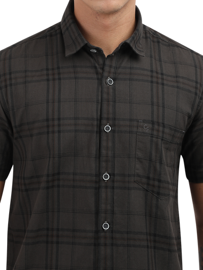 Model wearing Clarke Gable's Grey Checked Semi Casual Shirt in a casual setting